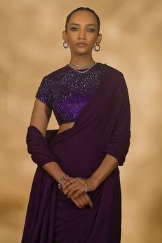 Purple pre-draped saree in a solid base with cutdana embellished tassels on pallu. Comes with blouse embellished by rhinestones. - Aza Fashions Nikhil Thampi, Draped Saree, Drape Saree, Embellished Blouse, Purple Rhinestone, Saree With Blouse, Aza Fashion, Tassels, High Neck