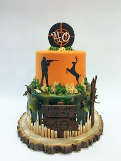 a birthday cake decorated with an image of a deer and the number forty