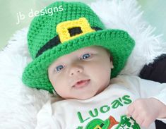 a baby wearing a st patrick's day hat