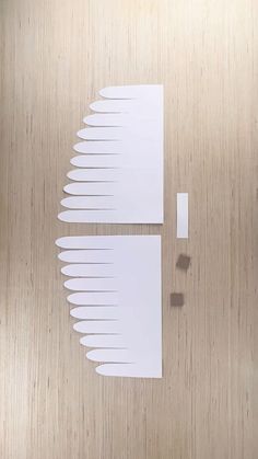 someone is making a paper palm from cardboard