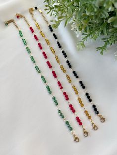 Measurements: 6-7.50 inches (S/M) or 7-8.50 inches (M/L) Total Weight: 0.10 oz These dainty glass bead bracelets feature delicate beads with a stainless steel clasp and adjustable chain for a perfect fit. Simple yet elegant, they're perfect for layering or wearing alone, adding a subtle touch of sophistication to any outfit. Party Crystal Bracelet With Round Beaded Chain, Glass Beaded Chain Bracelets As Gift, Glass Beaded Chain Bracelets For Gifts, Glass Beaded Bracelets As A Gift, Glass Beaded Bracelets For Gift, Glass Beaded Bracelets, Bead Bracelets, Jewelry Patterns, Bracelet Patterns