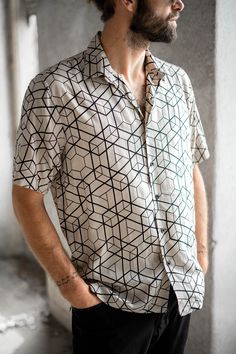 Where art meets fashion... Experience the perfect blend of style, comfort, and sustainability with our men's geometric shirts. Add a touch of tribal flair to your wardrobe and let your style speak volumes. Whether you're hitting the streets, exploring festivals, or simply lounging with friends, our shirts are designed to make a statement wherever you go. Each piece in our collection is a testament to our dedication to quality craftsmanship and attention to detail. From the digital design process Natural Clothing, Rave Party, Festival Clothing, Eco Friendly Fabric, Shape Of You, Natural Fabrics, Festival Outfits, Design Process, Party Wear