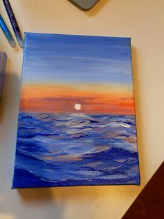 an acrylic painting of a sunset over the ocean with blue and orange colors