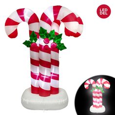 an inflatable christmas decoration with candy canes