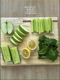 a cutting board topped with sliced up green vegetables