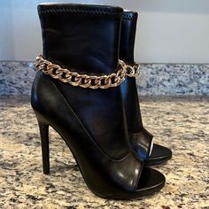 Steve Madden Faux Leather Heeled Open Toe Boots In Black With Silver Chain Embellishment - Inside Zip Closure - Ankle Material Has Stretch - Brand New - No Box - No Tags - Some Mild Material Wrinkling At Tops From Department Store Storage Without Support Inserts As Pictured - Pu Upper, Pu & Fabric Lining - Pu Sock - Manmade Outsole - Size 7m - Shelfm-Bin3 Party Boots With Ankle Strap Medium Width, Party Boots With Ankle Strap, Chic Party Boots With Metal Feet, Open Toe Faux Leather Boots For Night Out, Faux Leather Ankle Strap Party Boots, Faux Leather Open Toe Boots For Night Out, Open Toe Boots For Night Out In Fall, Elegant Open Toe Faux Leather Boots, Open Toe Leather Party Boots