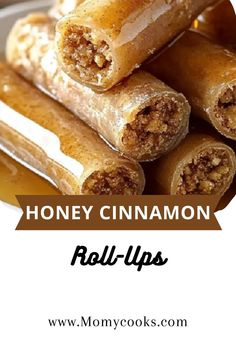 honey cinnamon roll ups stacked on top of each other with text overlay that reads, honey cinnamon roll ups