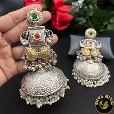 Gorgeous Jhumka in brass plating with 92.5 silver Polished and has real Pachi work. Ready to ship from New Jersey , United StatesMetal: Brass Size: BigNickel FreePerfect for all occasion(Party, Wedding ,Engagement)HandcraftedReady to ship from New Jersey , United StatesHighest quality and craftsmanship Long Earrings Silver, Trendy Jewellery, Long Silver Earrings, Jewellery Earrings, Fashion Jewelry Earrings, Green Turquoise, Trendy Jewelry, Fashion Jewellery, Earrings Silver