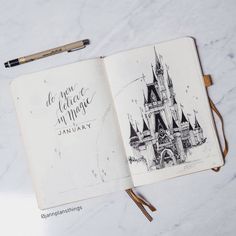 an open disney castle notebook with writing on it