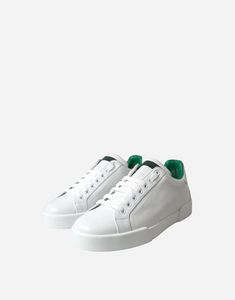 Step into luxury with Dolce & Gabbana Signature Portofino Sneakers. Crafted in Italy from 100% calfskin leather, these low-top sneakers exude sophistication. Featuring a timeless white and green color palette, lace-up closure, durable rubber sole, they marry style practicality. Complete logo details, Italian-made are must-have for the discerning fashion enthusiast. Green Colour Palette, Signature Logo, Sneakers For Sale, Top Sneakers, Green Colors, Calf Skin, Color Palette, Dolce And Gabbana, Lace Up