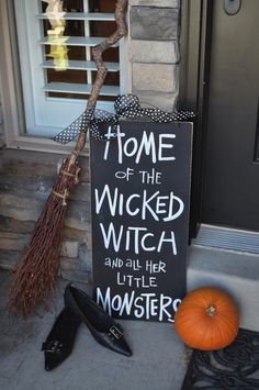 a sign that says home of the wicker witch and all her little monsters