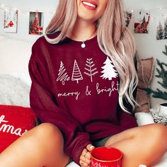 Celebrate the Season in Style with our Christmas Print Sweatshirt! Perfect for cozy holiday gatherings or a heartwarming gift, it’s the festive flair you need. Limited Edition – Grab yours before it’s gone! Cozy Red Holiday Tops, Cozy Crew Neck Top For Christmas, Cozy Holiday Crew Neck Top, Cozy Crew Neck Holiday Tops, Cozy Crew Neck Top For Holidays, Halloween Drinks, Cozy Holiday, Christmas Print, Swimwear Cover