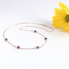 Add subtle sparkle to your outfit with this dainty purple amethyst necklace. This delicate necklace features your choice of either 3 or 5 purple amethyst gemstones on your choice of sterling silver or 14k gold filled chain. Lengths are available from 14 - 20 inches. Amethyst is the February birthstone. Your new necklace will arrive in a gift box. More amethyst jewelry https://www.etsy.com/shop/AustinDowntoEarth?search_query=amethyst More gemstone necklaces https://www.etsy.com/shop/AustinDowntoE Delicate Purple Jewelry For Everyday Wear, Delicate Purple Jewelry For Everyday, Dainty Purple Necklace For Everyday Wear, Everyday Amethyst Birthstone Necklace, Elegant Everyday Amethyst Necklace, Dainty Amethyst Jewelry With Delicate Chain, Minimalist Purple Necklace For Everyday, Everyday Purple Amethyst Necklaces, Everyday Purple Amethyst Necklace