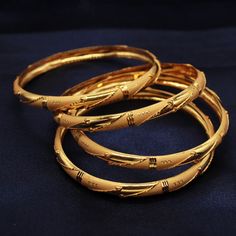 Round Gold Jewelry For Puja, Gold Round Jewelry For Puja, Gold Jewelry With Intricate Design For Puja, Elegant Yellow Gold Marriage Bracelet, Elegant Yellow Gold Bracelet For Marriage, Elegant Bangle With Intricate Design For Marriage, Gold Bracelets With Intricate Design For Marriage, Gold Plated Bangle For Marriage, Intricate Design Bracelet Jewelry For Marriage