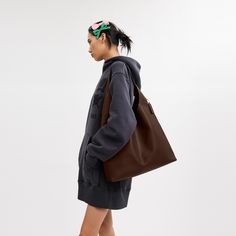 Our Brooklyn is an elegant minimalist silhouette—with a distinctly New York attitude. Crafted of natural grain leather with beautiful texture and soft feel this generously sized hobo style features a spacious interior with room for a 15” laptop and a snap pocket for access to essentials. The streamlined 39 is finished with a comfortable wide shoulder strap and an easy magnetic snap closure. | Coach Brooklyn Shoulder Bag 39 - Women's Purses - Brass/maple Working Bag For Women, Coach Fall Shoulder Bag With Double Handle, Coach Hobo Bags Outfit, Coach Double Handle Shoulder Bag For Fall, Coach Double Handle Fall Shoulder Bag, Coach Fall Double Handle Shoulder Bag, Coach Bags For Daily Use In Fall, Smooth Grain Hobo Bag In Tote Shape For Work, Smooth Grain Tote Hobo Bag For Work