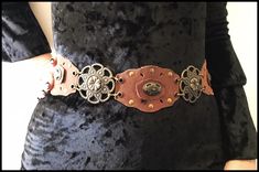 Please read shop policies before purchase, thank you  Vintage Leather Boho Belt with Flowers. Vintage Leather Hippie Floral Belt. There is no holes on belt, it ties up. Length without stripes for ties up: 80 cm. ( 31.49" ) Width: 7 cm. ( 2.75" ) PLEASE READ I don't accept returns, exchanges, cancellations, or money refund. So please ask for measures and everything you want to know before purchase item, thank you! Shipping time for EU is about 1-3 weeks ( only count working days, weekend and Holi Floral Belt, Boho Belt, Boho Belts, Vintage Hippie, Flowers Vintage, Suspender Belt, Boho Hippie, Serbia, Aesthetic Fashion