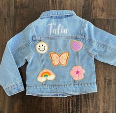 Hi there! Welcome to my shop. These unisex personalized embroidered denim jacket are available in toddler and children's sizes. These Custom denim jacket makes the best birthday or baby shower gift! Jacket is light wash and has a slightly oversized fit. Patches are SEWN ON so you can put these in the washer. Because these are one of a kind, returns are not accepted. Each item is made to order and machine embroidered by me so slight variations may occur. I am unable to replace/refund purchases ba Customizable Cotton Denim Jacket For Fall, Customizable Long Sleeve Denim Jacket For Spring, Customizable Denim Outerwear For Spring, Customizable Cute Cotton Outerwear, Customizable Blue Denim Jacket For Spring, Cute Customizable Cotton Outerwear, Customizable Denim Jacket For Spring, Cute Cotton Denim Jacket With Pockets, Cute Medium Wash Cotton Outerwear