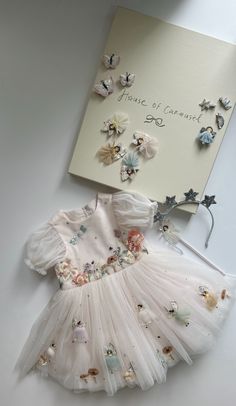 Every dress we design is not just about beauty and comfort — it’s also about creating a vocabulary of mood and style that little ones fall in love with. Hearing from our customers how their children adore our dresses and never want to take them off fuels our passion and inspires us to infuse whimsy and wonder into every piece we craft.  ✨ Featuring our Enchanted Garden Dress in Apricot, a true celebration of magic and charm. 🌸 Fairy Garden Dress, Enchanted Garden Dress, Kids Wedding Outfits, Princess Tutu Dress, Ballerina Costume, Fairytale Illustration, Garden Dress, Kid's Fashion, Enchanted Garden