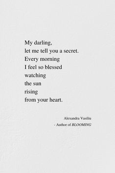 a white wall with a quote on it that says, my daring let me tell you a secret every morning i feel so blessing the sun rising from your heart