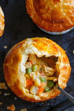 a chicken pot pie with a spoon in it