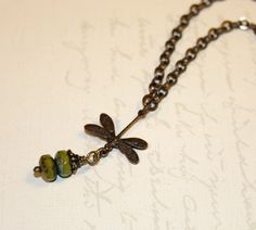 Woodland necklace, dragonfly necklace, green czech glass, vintaj brass on Etsy, $27.00 Green Antique Finish Jewelry For Gift, Vintage Charm Green Brass Necklaces, Green Brass Necklaces With Vintage Charm, Green Bohemian Necklace With Vintage Charm, Vintage Green Necklace With Oxidized Finish, Handmade Vintage Dragonfly Necklace, Vintage Handmade Dragonfly Necklace, Necklace Inspiration, Dragonfly Necklace