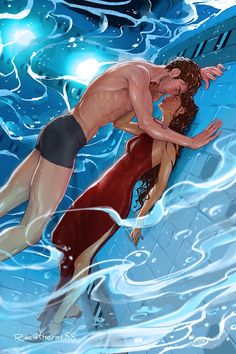 a man and woman are kissing in the water with their arms around each other as they swim