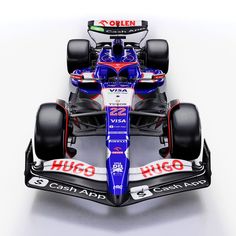 a red white and blue race car on a white background