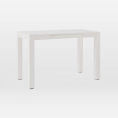 a white table with one drawer on the top and two drawers at the bottom, against a white background