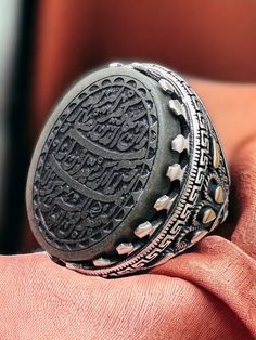 Islamic Quranic \ Natural Natural Jade,Al Ghalam Verse 925 silver Ring, Shia,Ahlebet,Ahlulbeyet Stone size is 18x25mm وَإِن يَكَادُ الَّذِينَ كَفَرُوا لَيُزْلِقُونَكَ بِأَبْصَارِهِمْ لَمَّا سَمِعُوا الذِّكْرَ وَيَقُولُونَ إِنَّهُ لَمَجْنُونٌ Islamic Scraping,Islamic Men's Ring,Islamic Carving,Islamic Gift for Men,Islamic Unique Gift,Islamic Ring Gift,Silver Men's Ring Handmade Silver Ring,Father's Day Gift,Best Gift for Man,Gift for Muslim Men,Gifts for Boyfriend,Gifts for Dad,Gifts for Girlfrie Traditional Carved Ceremonial Rings, Traditional Carved Rings For Ceremonial Occasions, Traditional Stamped 925 Engraved Ring For Ceremonial Occasions, Traditional Engraved Ceremonial Ring Stamped 925, Silver Antique Carved Rings, Traditional Engraved Ring As Gift, Traditional Engraved Ring For Gift, Antique Silver Carved Rings, Traditional Oval Engraved Ring With Intricate Design