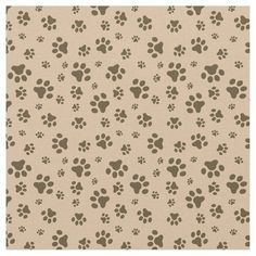 a beige background with brown paw prints on the front and back of it, which is very