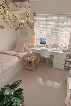 a bedroom with a bed, desk and shelves on the wall next to a window