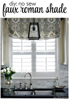 a kitchen window with roman shades over it and the words diy no sew faux roman