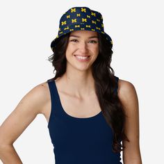 We know you're the biggest fan around. But does everyone else? Well, they'll know when you're beating the warm weather wearing this Michigan Wolverines Mini Print Boonie Bucket Hat. Features All-over, team-colored design so you can rep the team in style Repeat team logo display, in case there were any doubts where your allegiances lie Wide brim, versatile outdoor hat to keep you cool and comfortable Details Material: Polyester Officially licensed Imported Sports Fan Cotton Hat, Sports Fan Cotton Hat For Fan Merchandise, Sports Fan Hat In Cotton For Fan Merchandise, Casual Snapback Hats For Fan Events, Casual Cap For Fan Events, Casual Team-colored Hats For Fans, Outdoor Hat, Logo Display, Outdoor Hats