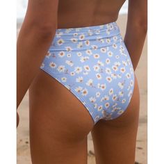 Our Favorite Kind Of Summertime Blues. High-Waisted With The Vibes To Match, This Blue Daisy Print High Maui Bikini Bottom Is Made With A Premium Blend Of Recycled Fabric Cut In A Medium-Coverage Style That Rises High Like, Above-The-Belly-Button High. It's Ideal Of Surf But Also Looks Stunning Laid Back On The Sand. It's Ultra Soft And Super Stretchy, But The Real Show Stopper Here Is That Dreamy Floral And Sky Blue Print. Now All We Need Is Some Sunshine And Saltwater. Women's High-Waisted Bik Fitted High Rise Beach Bottoms, High Rise Fitted Bottoms For Beach, High Rise Bottoms For Beach Season Sunbathing, High Waist Summer Bottoms For Pool, High Rise Summer Pool Bottoms, Light Blue Summer Swimwear, Light Blue Tankini For Sunbathing, Light Blue Summer Tankini For Beach Season, Summer Light Blue Tankini For Beach Season