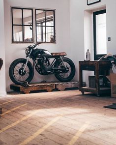 a motorcycle is parked in the middle of a room