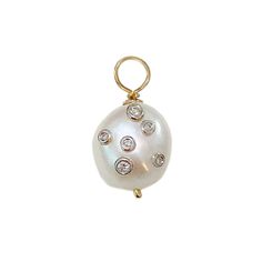 This finely handcrafted Baroque cultured freshwater pearl is finished with 14K solid gold detailing and accented with genuine GVs1 quality natural real diamonds scattered on the surface of the pearl. Pendant Dimensions: varies based on each unique pearl, the following dimensions are an average approximation 20mm (L, including the bail) x 10mm (W) x 4.75mm (bail size) Metal Finish: High Shine Polish This design is available in Rose, White and Yellow 14K Gold Please note that this item takes about Diamond Charm, White Freshwater Pearl, Solitaire Pendant, Pearl Charms, Charm Gift, Baroque Pearls, Unique Necklaces, Quality Diamonds, Real Diamonds