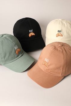 Get ready to hit a home run in style with our Oui Croissant Baseball Cap! The cute embroidery takes this classic hat to the next level, making it perfect for any casual outfit. (Score a fashion win with this cap that screams "oui" to croissants and style!) Casual Visor Hat With Letter Embroidery, Casual Snapback Hat With Letter Embroidery, Casual Baseball Cap With Letter Embroidery And Curved Brim, Casual Baseball Cap With Letter Embroidery, Casual Trucker Hat With Letter Embroidery And Curved Brim, Trendy Embroidered Logo Hats For Baseball Season, Casual Snapback Hat With Letter Embroidery For Baseball Season, Casual Hats With Letter Embroidery For Baseball Season, Casual Baseball Season Hat With Letter Embroidery