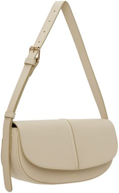 Buffed leather shoulder bag in beige. · Adjustable shoulder strap · Gold-tone logo stamp at face · Magnetic foldover flap · Patch pocket at interior · Cotton twill lining · Gold-tone hardware · H5 x W10 x D3 Supplier color: Cream Modern Cream Flap Shoulder Bag, Classic Cream Shoulder Bag With Adjustable Strap, Modern Beige Flap Shoulder Bag, Classic Cream Shoulder Bag With Magnetic Closure, Classic Beige Baguette Bag With Detachable Strap, Business Shoulder Bag With Detachable Strap In Cream, Business Flap Bag In Beige With Detachable Strap, Beige Flap Bag With Adjustable Strap For Business, Beige Flap Bag For Business