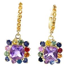 5.13 Carat Amethyst Multi Color Sapphire Drop Earrings Item Specs: 2 Cushion Cut Amethysts = 2.68 carats 8 Round Cut Amethysts = 0.54 carats 30 Multi-Colored Sapphires = 1.91 carats Total Carat Weight of Earrings = 5.13 carats 14K Yellow Gold = 7.9 grams Purple Multi-stone Earrings For Anniversary, Sapphire Drop Earrings, Cushion Cut, Round Cut, Fashion Art, Jewelry Earrings Dangle, Jewelry Box, Etsy Earrings, Etsy Accessories