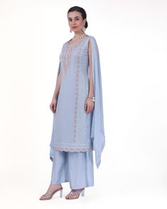 Arya Georgette Tiki Resham Embroidered Palazzo Suit. Readymade premium georgette fabric Enhanced with tiki & resham embroidery work Comes with dupatta, palazzo pants Sleeves attached as per image. Experience elegance and comfort with our Arya Palazzo Suit. Made with high-quality georgette fabric and featuring stunning Tiki Resham embroidery, this suit is perfect for any occasion. The palazzo pants provide a relaxed fit and added convenience. Designer Wear Floor-length Chikankari Embroidery Sets, Designer Chikankari Embroidery Floor-length Set, Embroidered Floor-length Palazzo Set In Chinon, Silk Floor-length Sets With Chikankari Embroidery, Embroidered Floor-length Chinon Palazzo Set, Formal Embroidered Chanderi Palazzo Set, Navratri Georgette Set With Dupatta, Floor-length Georgette Salwar Kameez With Resham Embroidery, Designer Floor-length Palazzo Set With Sheer Dupatta