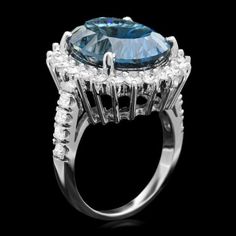 12.50 Carats Natural Blue Topaz and Diamond 14K Solid White Gold Ring Total Natural Blue Topaz Weight is: Approx. 11.00 Carats Blue Topaz Measures: Approx. 16.00 x 12.00mm Natural Round Diamonds Weight: Approx. 1.50 Carats (color G-H / Clarity SI1-SI2) Ring total weight: Approx. 9.3 grams Disclaimer: all weights, measurements and colors are approximate and may vary slightly from the listed dimensions or as seen in the image. All pictures are magnified to show the smallest of details. Please, ref Formal Aquamarine Diamond Ring With Brilliant Cut, Aquamarine Brilliant Cut Diamond Ring For Formal Occasions, Formal Gia Certified Diamond Topaz Ring, Formal Aquamarine Diamond Ring With Prong Setting, Luxury Blue Topaz Halo Ring, Formal Blue Brilliant Cut Gemstones, Luxury Formal Blue Topaz Diamond Ring, Blue Gia Certified Diamond Ring For Formal Occasions, Blue Brilliant Cut Gemstones For Formal Occasions