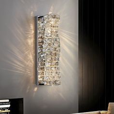 a wall mounted light fixture in a living room