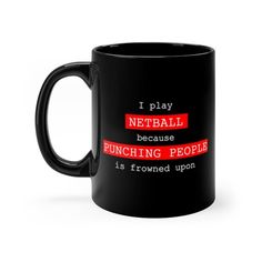 a black coffee mug with the words i play basketball because punching people is allowed upon