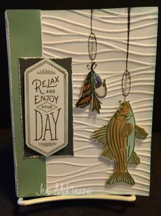 a card with some fish hanging from it