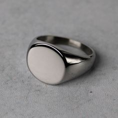 Premium Stainless Steel Color: Steel Height: Approx 15mm Width: Approx 17mm Available Sizes 7 / 8 / 9 / 10 / 11 / 12 (Choose Your Us Ring Size) Safe In Water No Tarnish No Green Finger Also Available In Gold Classic White Oval Signet Ring, Classic Oval White Signet Ring, Modern White Oval Signet Ring, Minimalist Stainless Steel Signet Ring, Modern White Round Signet Ring, Oval Stainless Steel Signet Ring As Gift, Oval Stainless Steel Signet Ring For Gift, Classic Oval Stainless Steel Rings, Silver Figaro Chain Necklace