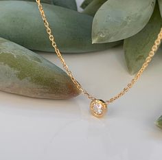 "Diamond Solitaire Necklace in 14k Yellow Gold Metal--14k Yellow Gold ( solid gold ) --Bezel setting --Diamond weight---0.20CT --Diamond Color----G --Diamond quality---SI1 NATURAL DIAMOND Available in Rose Gold too Necklace is 18\" , we can add a loop to make it adjustable to 16\"" Dainty Yellow Gold Necklace With Smooth Bezel, Gold Solitaire Pendant Necklace With Bezel Setting, Gold Solitaire Necklace With Bezel Setting, Gold Solitaire Diamond Necklace Gift, Minimalist Gold Solitaire Necklace With Smooth Bezel, Gold Pendant Diamond Necklace With Bezel Setting, Gold Diamond Pendant Necklace With Bezel Setting, Fine Jewelry Solitaire Necklace With Smooth Bezel As Gift, Classic Gold Solitaire Necklace With Smooth Bezel