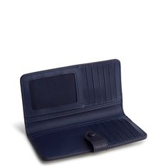 Meet our Tab Wallet, the perfect blend of style, functionality and organization. Crafted from high-quality materials, this spacious wallet offers ample room for your cards, cash, coins and more, keeping everything neatly organized and easily accessible. Whether you're running errands, heading to work or traveling, our wallet offers the perfect combination of functionality, durability and style to meet your everyday carry needs. Vera Bradley Tab Wallet in Tiny Garden Green/Purple Everyday Purple Bag With Card Slots, Purple Wallets With Removable Pouch For Everyday Use, Purple Rfid Blocking Wallets For Travel, Bifold Wallets With Interior Card Slots, Purple Rfid Blocking Wallet For Travel, Purple Rfid-blocking Travel Wallet, Purple Rfid Blocking Travel Wallet, Purple Wallet With Card Slots For Everyday Use, Purple Wallets With Card Slots For Everyday Use