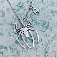 Tarantula necklace, tarantula jewellery, spider lover gifts, spider inspired gifts, spider pendant necklace, gothic necklace, pet spider, Why not have a go at the LUCKY DIP https://www.etsy.com/listing/1095282417/charm-necklace-jewellery-lucky-dip-charm Add on a PERSONALISED GIFT BOX  https://www.etsy.com/listing/1170103232/add-gift-boxes-to-your Add on a bestfriend charm https://www.etsy.com/listing/1185120378/add-a-best-friend-charm-to-any-piece-of Materials * 19mm silver spider charm  * 6mm s Spider Inspired Jewellery, Halloween Gift Metal Necklace, Halloween Themed Silver Necklaces, Themed Silver Necklaces For Halloween, Unique Halloween Gift Necklaces, Unique Necklaces For Halloween Gift, Gothic Pendant Necklace Gift, Silver Themed Necklace For Halloween, Gothic Pendant Necklace As Gift