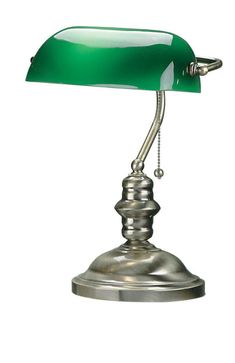 a green desk lamp sitting on top of a metal base