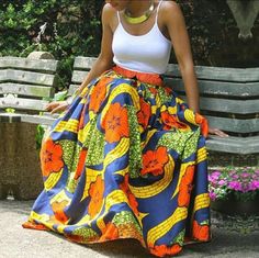 Reinvent Your Style With These Beautiful African Dasiki Skirt It Is Good For Any Occasion African Chic, Style Africain, Afrikaanse Mode, Pleated Long Skirt, African Inspired Fashion, African Girl, Floral Maxi Skirt, African Print Fashion, African Wear